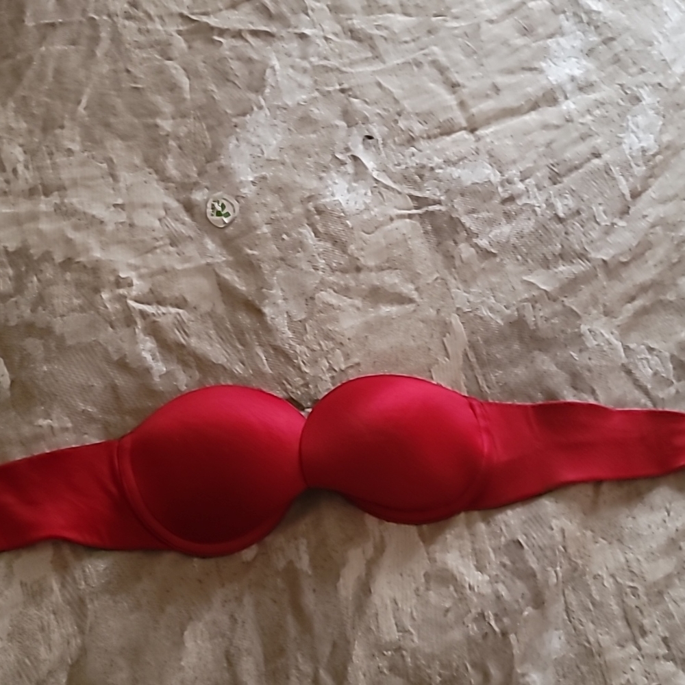 Red strapless Victoria’s Secret bra